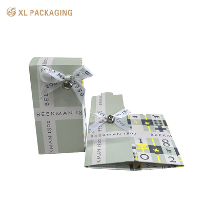 comprar Caja de cartón de papel plegable de cartón carpeta de labio caja de embalaje con cinta de arco online manufacture