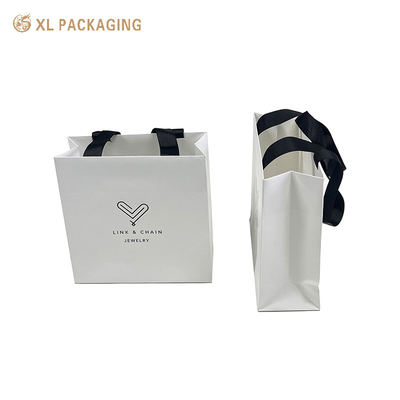 comprar Bolsa de papel de impresión de lujo personalizada Bolsa de papel de regalo Bolsa de papel de embalaje con el logotipo personalizado Bolsa de embalaje de tela Bolsa de envío online manufacture