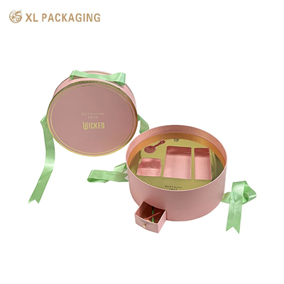 comprar Cajas de lujo personalizadas, al por mayor, caja de papel cosmético redonda con un diseño único, caja de cajón pequeño, cinta verde, mango y bandeja de oro para artículos de belleza. online manufacture