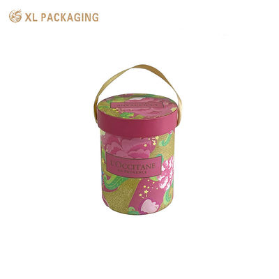 Caja de regalo redonda de tubo de papel personalizada con cartón rígido de 2 mm, impresión CMYK a 4 colores y asa de cinta de satén dorada