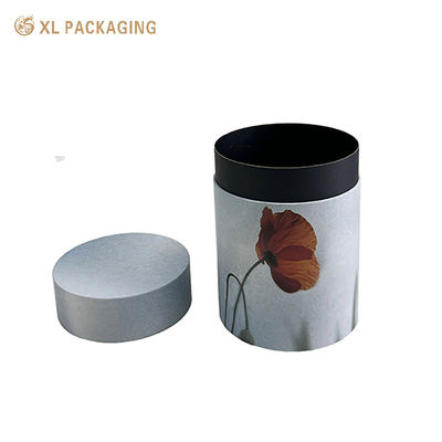 Tubos de embalaje de regalo de cartón cilíndrico impreso a medida con papel de arte recubierto de 157 gramos y mango de cuerda de algodón negro