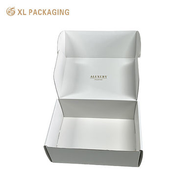 Envío plano Cajas de correo blancas onduladas en cartón doble gris envuelto en embalaje mate para té, chocolate y productos de belleza