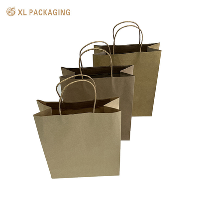 Logotipo personalizado Bolsas de compras Kraft recicladas Estilo boutique Diseño fácil de llevar Material sostenible Perfecto para compras diarias Embalaje de regalos Marcas ecológicas