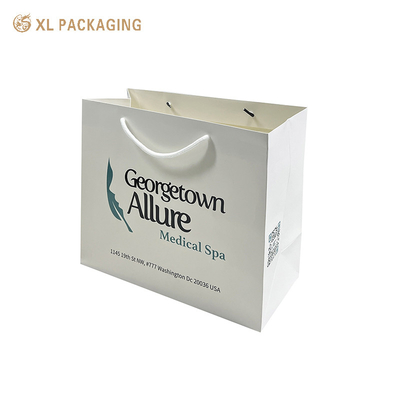 Logotipo de la empresa personalizado Bolsas de papel de compras Bolsas de papel recubiertas de alta calidad Bolsas de mano de papel para ropa zapatos y envases minoristas - Manos resistentes Gloss / Matt Lamination & Discuentos de pedido a granel