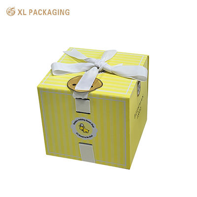 Caja de regalo cosmética de explosión personalizada con arco de cinta de satén e inserto cortado a presión para envases de cuidado de la piel de lujo