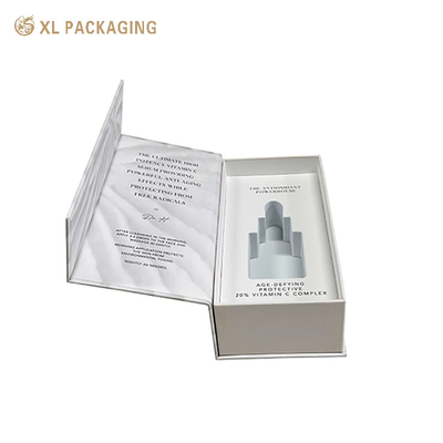 Caja de embalaje de papel kraft de papel negro en relieve para productos ecológicos para el cuidado de la piel